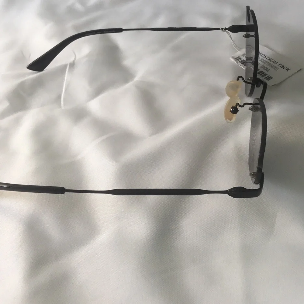 Alexander McQueen sleek rimless